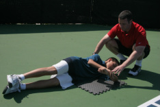 Mark Kovacs stretching student